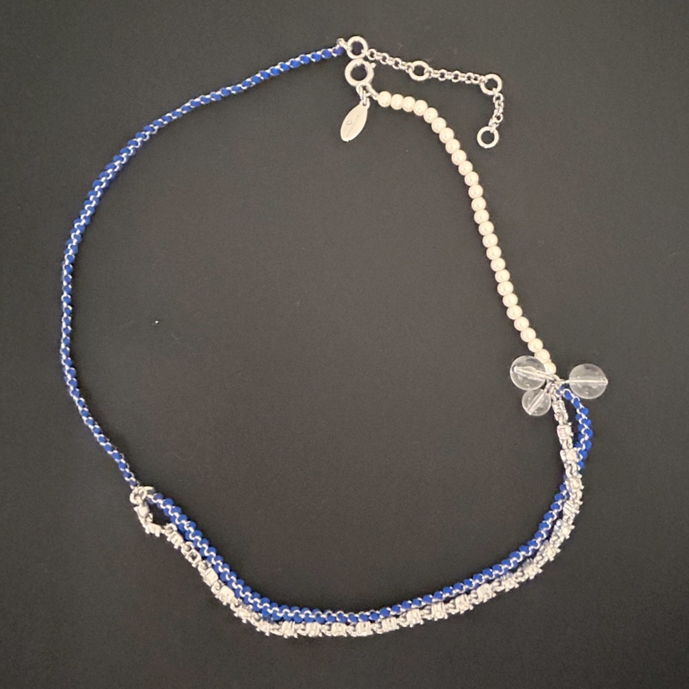 Faux pearls & rhinestone necklace.